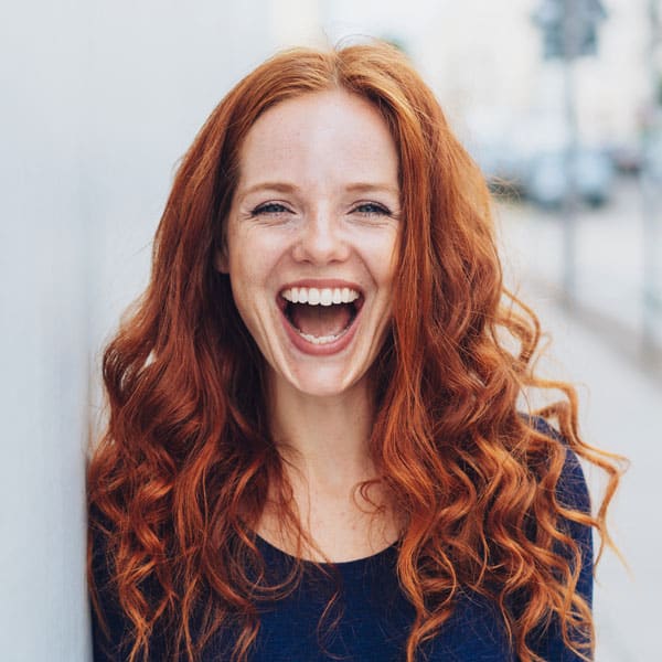 Woman smiling at Cook Orthodontics in Augusta, ME