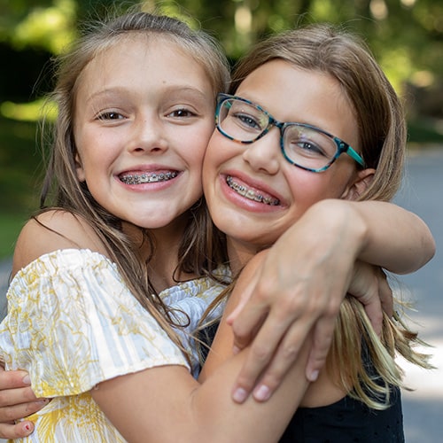 Girls with braces at Cook Orthodontics in Augusta, ME