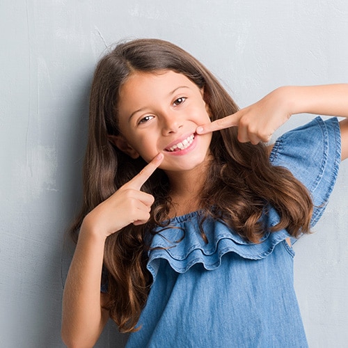 Girl smiling at Cook Orthodontics in Augusta, ME